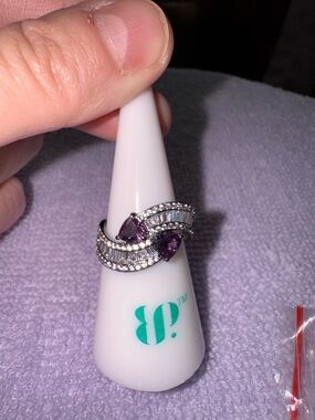 bp Silver Wave Ring with Purple Gemstones and Clear Accents